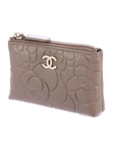 chanel camellia key purse|Chanel camellias.